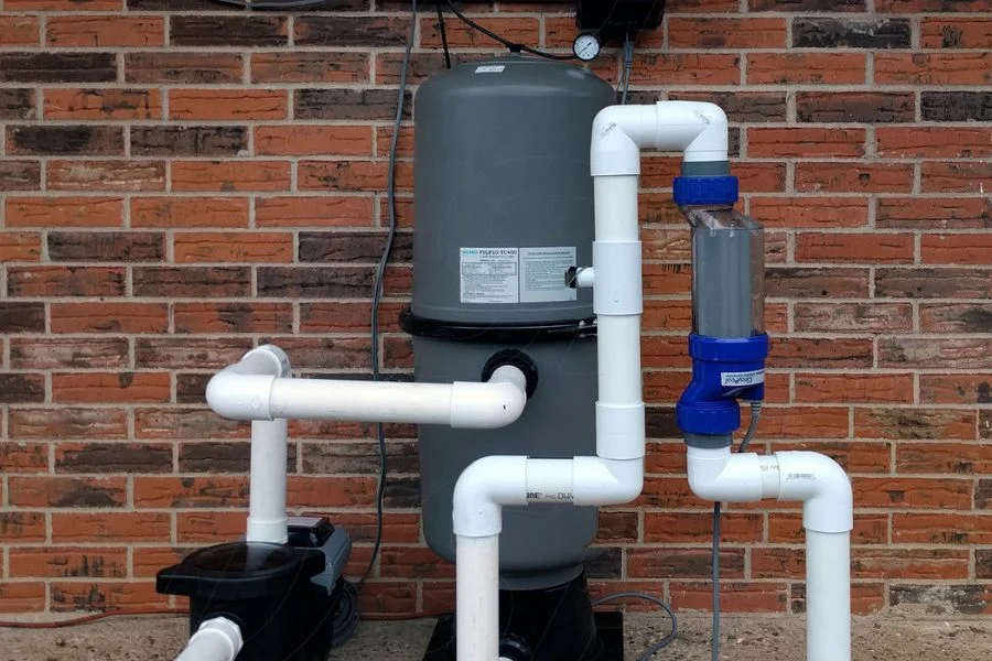 A saltwater generator plumbed in a pool filtration system
